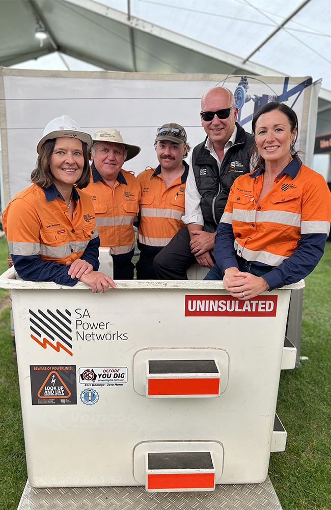 SA Power Networks staff get a group photo in the photo booth at the South East Field Days